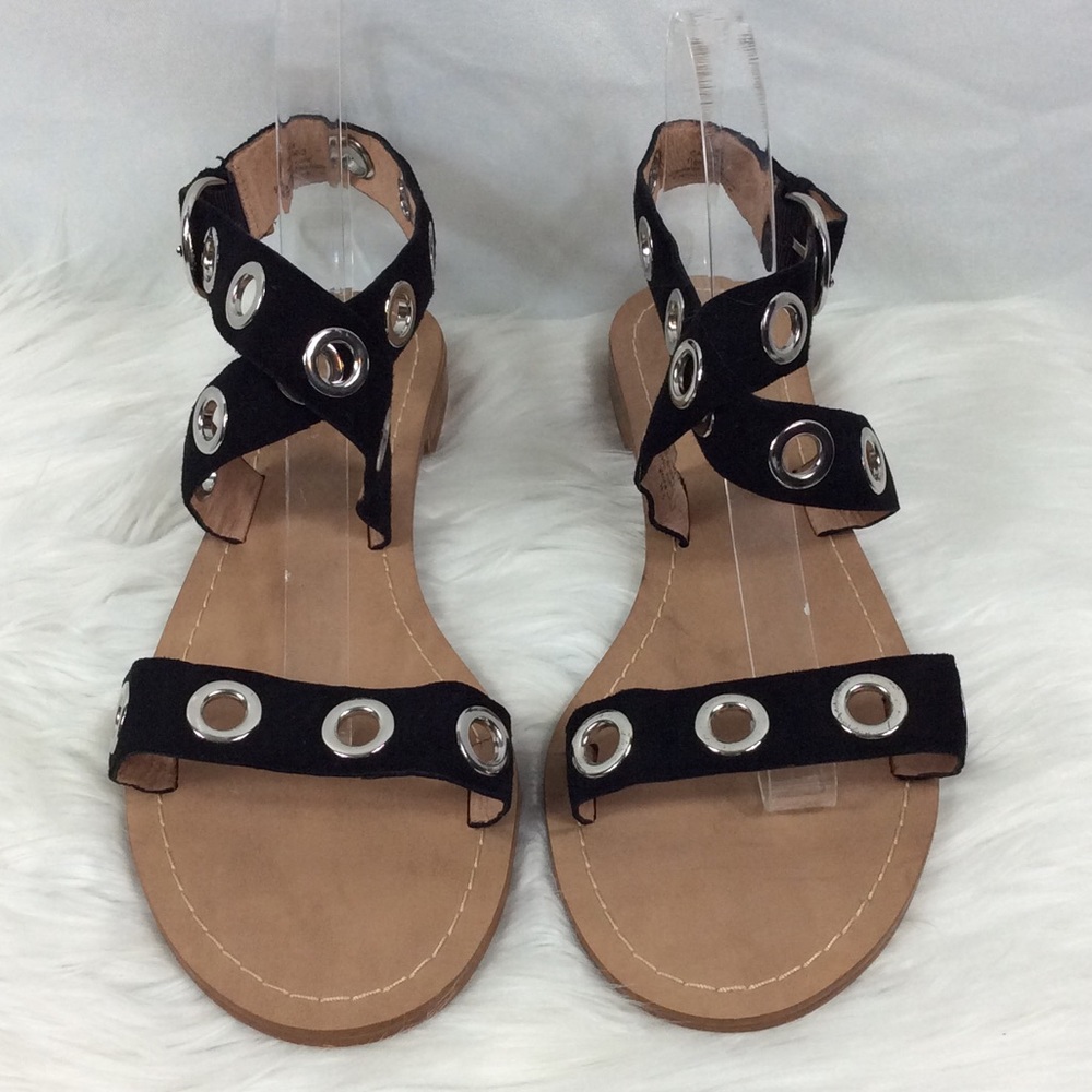 Halogen strappy sandals with silver grommets.